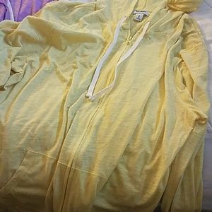 Zip up hoodies. Light material